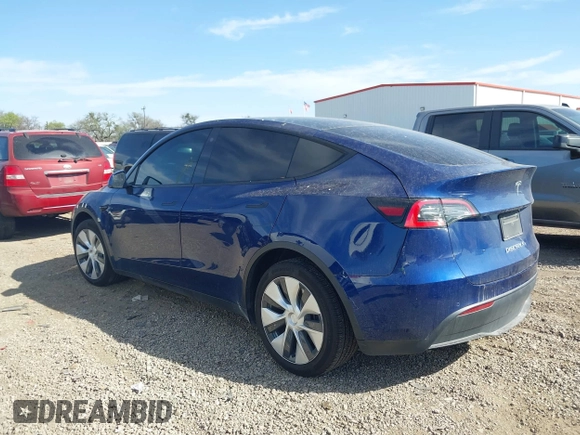 2021 Tesla Model Y Standard Range z VIN 5YJYGDED6MF107711, wystawiony jako IAAI lot #41794384 z przebiegiem 86 934 mil mil oraz . Historia ofert i sprzedaży dostępna na DreamBid. Obrazek 14.