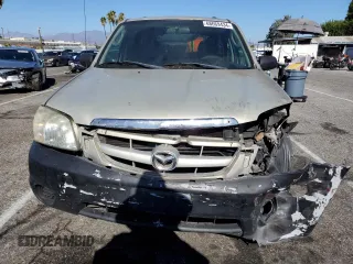 2005 Mazda Tribute i with VIN 4F2YZ02Z85KM31234, listed as a Copart auction lot 68669434 with 211,921 mi miles and Salvage Title. Bid and sale history available at carsss.com. Image 5.