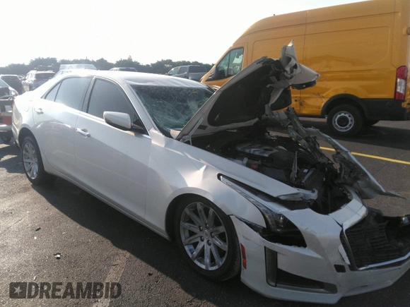 2014 Cadillac CTS RWD z VIN 1G6AP5SXXE0180377, wystawiony jako IAAI lot #41940004 z przebiegiem 87 419 mil mil oraz . Historia ofert i sprzedaży dostępna na DreamBid. Obrazek 1.