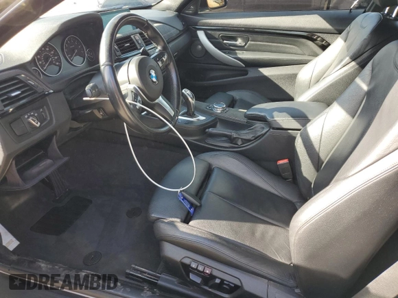 2014 BMW 4 Series 435i xDrive with VIN WBA3R5C59EK187836, listed as a Copart auction lot 63946075 with 100,700 mi miles and Salvage title. Bid and sale history available at DreamBid. Image 7.