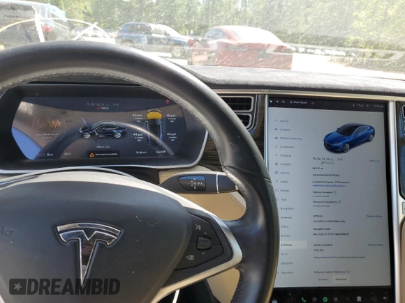2014 Tesla Model S 60 with VIN 5YJSA1H10EFP52850, listed as a Copart auction lot 54321805 with 58,031 mi miles and Salvage Title. Bid and sale history available at DreamBid. Image 9.