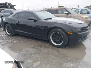2013 Chevrolet Camaro LS с VIN 2G1FA1E39D9205949, выставлен на аукционе IAAI как лот 41613682 с пробегом 166 654 миль миль и . История ставок и продаж доступна на DreamBid. Изображение 1.