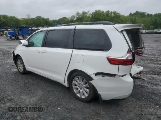 2015 Toyota Sienna LE with VIN 5TDJK3DCXFS126604, listed as a Copart auction lot 56987355 with 102,079 mi miles and Salvage title. Bid and sale history available at DreamBid. Image 2.