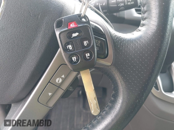 2011 Honda Odyssey Touring with VIN 5FNRL5H90BB070472, listed as a IAAI auction lot 42367710 with 203,589 mi miles and . Bid and sale history available at DreamBid. Image 11.