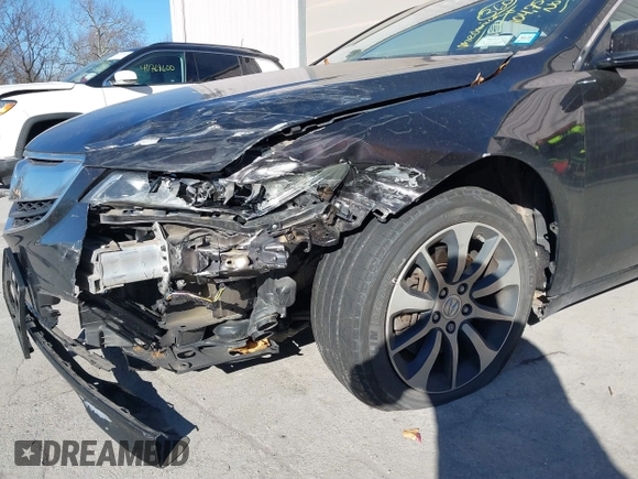 2015 Acura TLX Tech with VIN 19UUB1F51FA014434, listed as a IAAI auction lot 40791595 with 104,757 mi miles. Bid and sale history available at carsss.com. Image 6.