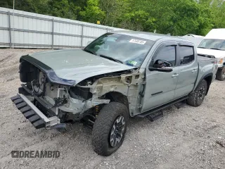 2023 Toyota Tacoma SR with VIN 3TMCZ5AN6PM605206, listed as a Copart auction lot 57506765 with 28,568 mi miles and Salvage title. Bid and sale history available at DreamBid. Image 1.