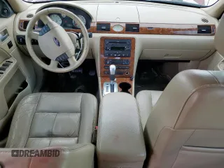 2005 Ford Five Hundred Limited с VIN 1FAFP281X5G149230, выставлен на аукционе Copart как лот 54117335 с пробегом 82 647 миль миль и Списание • Salvage title. История ставок и продаж доступна на DreamBid. Изображение 10.