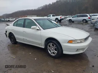 2000 Mitsubishi Galant ES z VIN 4A3AA46G3YE125518, wystawiony jako IAAI lot #41951670 z przebiegiem Nie podano mil oraz . Historia ofert i sprzedaży dostępna na DreamBid. Obrazek 1.