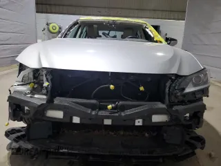 2021 Lexus ES 250 with VIN 58AD11D13MU005655, listed as a Copart auction lot 52137355 with 32,107 mi miles and Salvage title. Bid and sale history available at DreamBid. Image 5.