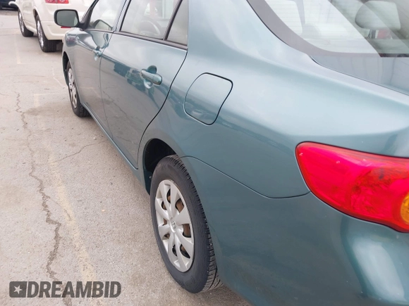 2010 Toyota Corolla with VIN 2T1BU4EEXAC379685, listed as a IAAI auction lot 41977194 with 158,850 mi miles and . Bid and sale history available at DreamBid. Image 12.