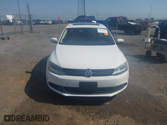 2014 Volkswagen Jetta TDI w/Premium/Nav with VIN 3VWLL7AJXEM366828, listed as a IAAI auction lot 42392563 with 132,924 mi miles and . Bid and sale history available at DreamBid. Image 12.
