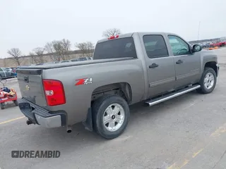 2013 Chevrolet Silverado 1500 LT with VIN 3GCPKSE73DG249856, listed as a IAAI auction lot 41973964 with 135,580 mi miles. Bid and sale history available at carsss.com. Image 4.