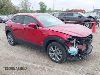 2023 Mazda CX-30 S Premium with VIN 3MVDMBDM3PM511402, listed as a IAAI auction lot 42180001 with 6,189 mi miles and . Bid and sale history available at DreamBid. Image 1.