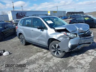 2017 Subaru Forester z VIN JF2SJABC6HH451001, wystawiony jako IAAI lot #41924341 z przebiegiem 163 456 mil mil oraz . Historia ofert i sprzedaży dostępna na DreamBid. Obrazek 1.