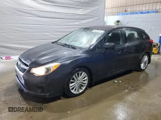 2012 Subaru Impreza Premium with VIN JF1GPAD65CH220163, listed as a Copart auction lot 61016015 with 149,966 mi miles and Salvage title. Bid and sale history available at DreamBid. Image 1.