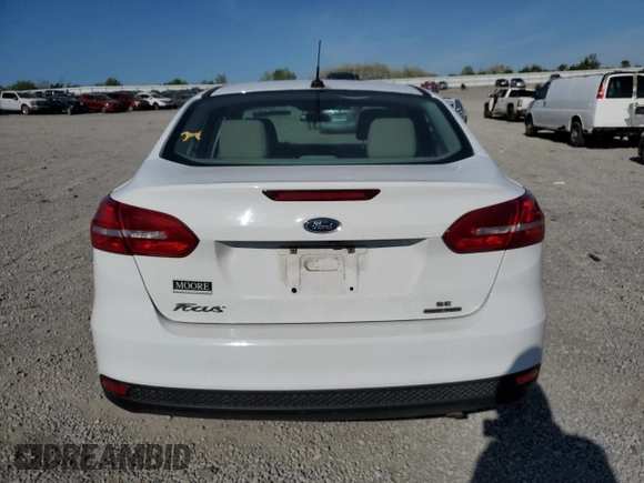 2016 Ford Focus SE с VIN 1FADP3F25GL283615, выставлен на аукционе Copart как лот 52292275 с пробегом 146 155 миль миль и Списание • Salvage title. История ставок и продаж доступна на DreamBid. Изображение 6.