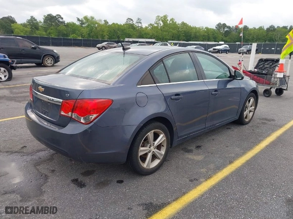 2014 Chevrolet Cruze 2LT with VIN 1G1PE5SB0E7167252, listed as a IAAI auction lot 42017261 with 100,310 mi miles. Bid and sale history available at carsss.com. Image 4.