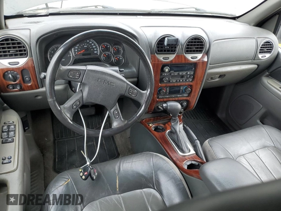 2004 GMC Envoy SLE with VIN 1GKDT13S442155788, listed as a Copart auction lot 50270135 with 164,271 mi miles and Salvage Title. Bid and sale history available at carsss.com. Image 8.