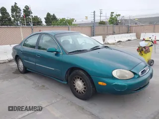 1996 Mercury Sable LS z VIN 1MELM53S0TG600877, wystawiony jako IAAI lot #42063937 z przebiegiem 200 405 mil mil oraz . Historia ofert i sprzedaży dostępna na DreamBid. Obrazek 1.
