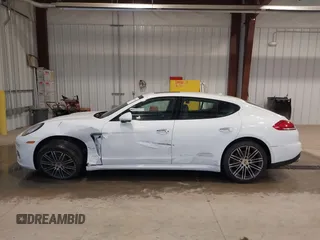 2016 Porsche Panamera 4 z VIN WP0AA2A71GL000087, wystawiony jako IAAI lot #41435476 z przebiegiem 103 537 mil mil oraz . Historia ofert i sprzedaży dostępna na DreamBid. Obrazek 14.