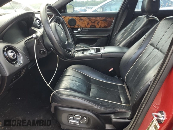 2013 Jaguar XJ with VIN SAJWJ1CD9D8V48888, listed as a Copart auction lot 62272685 with 166,533 mi miles and Clean title. Bid and sale history available at DreamBid. Image 7.