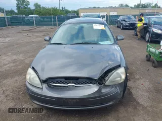 2003 Ford Taurus SE Standard with VIN 1FAFP53U43A233028, listed as a IAAI auction lot 42624211 with 65,364 mi miles and . Bid and sale history available at DreamBid. Image 12.
