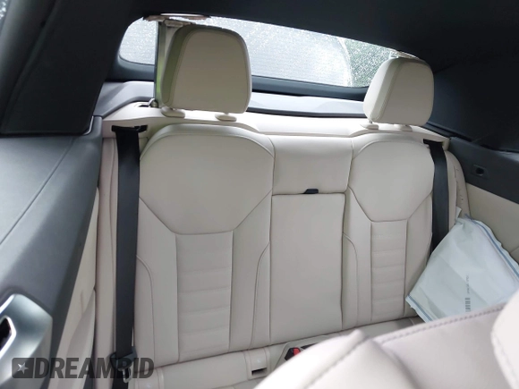 2023 BMW 4 Series 430i with VIN WBA23AT03PCL21070, listed as a IAAI auction lot 42730718 with 19,859 mi miles and . Bid and sale history available at DreamBid. Image 8.