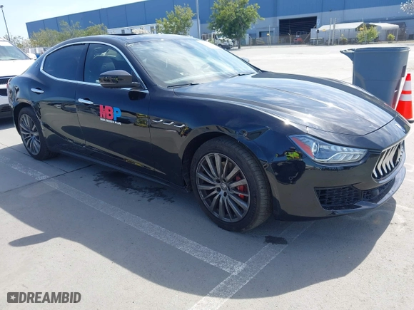 2019 Maserati Ghibli with VIN ZAM57XSA5K1328183, listed as a IAAI auction lot 41970101 with 61,260 mi miles. Bid and sale history available at carsss.com. Image 1.