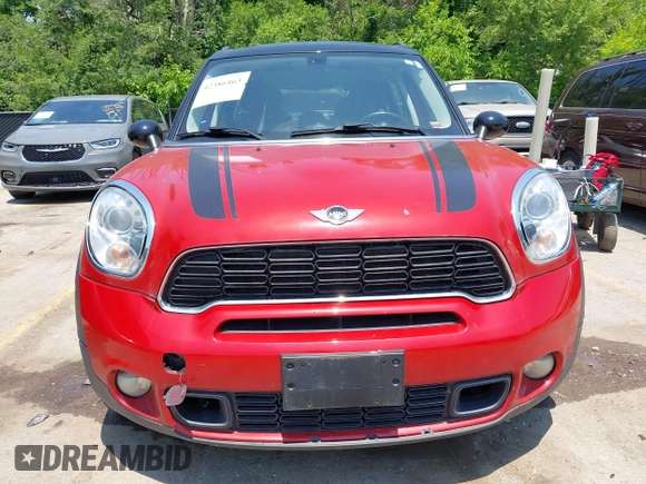 2013 MINI Countryman S with VIN WMWZC3C58DWP24865, listed as a IAAI auction lot 42386463 with 100,612 mi miles and . Bid and sale history available at DreamBid. Image 6.