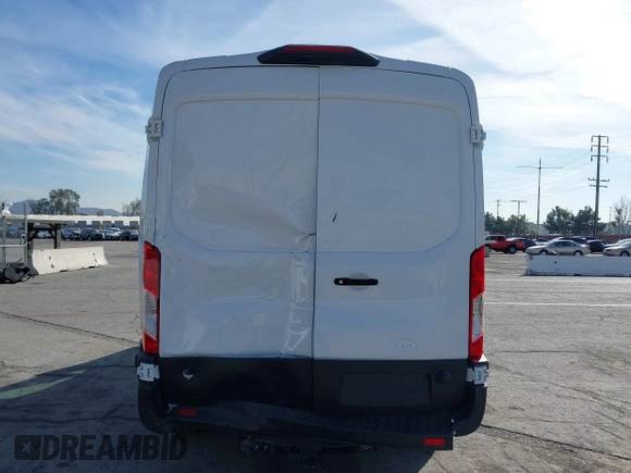 2023 Ford Transit Cargo with VIN 1FTBR1C85PKC08945, listed as a IAAI auction lot 41385685 with 5,577 mi miles and . Bid and sale history available at DreamBid. Image 17.