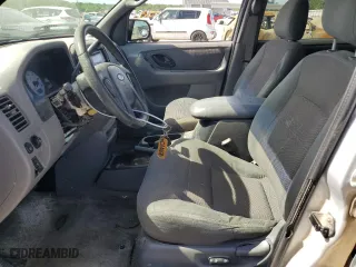 2002 Ford Escape XLT Choice with VIN 1FMYU03162KB99358, listed as a Copart auction lot 54183524 with 292,653 mi miles and Salvage Title. Bid and sale history available at carsss.com. Image 7.