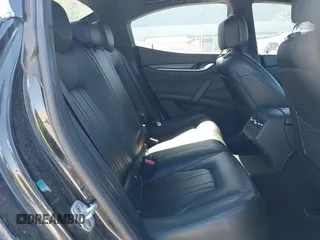 2014 Maserati Ghibli z VIN ZAM57XSA5E1091490, wystawiony jako IAAI lot #41848480 z przebiegiem 129 585 mil mil oraz . Historia ofert i sprzedaży dostępna na DreamBid. Obrazek 8.