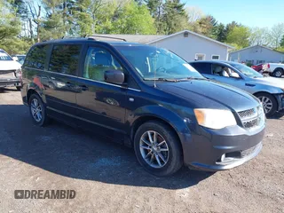 2014 Dodge Grand Caravan SXT with VIN 2C4RDGCG0ER223309, listed as a IAAI auction lot 42161438 with 175,867 mi miles and . Bid and sale history available at DreamBid. Image 1.
