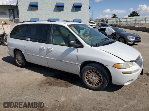 1998 Chrysler Town & Country LXi with VIN 1C4GP64L2WB637437, listed as a Copart auction lot 70504424 with 82,972 mi miles and Salvage Title. Bid and sale history available at carsss.com. Image 4.