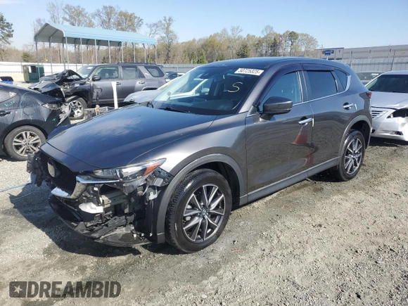 2018 Mazda CX-5 Touring with VIN JM3KFACM0J1430643, listed as a Copart auction lot 50725325 with 55,674 mi miles and Salvage Title. Bid and sale history available at carsss.com. Image 1.