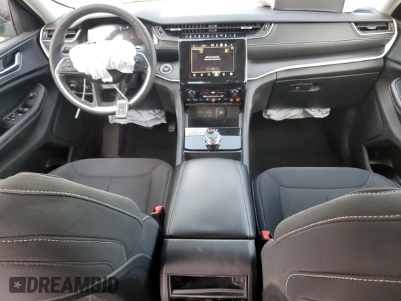 2023 Jeep Grand Cherokee Laredo with VIN 1C4RJHAG0PC674527, listed as a Copart auction lot 58538195 with 37,434 mi miles and Salvage title. Bid and sale history available at DreamBid. Image 8.