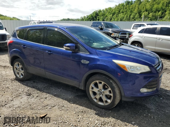 2013 Ford Escape SEL z VIN 1FMCU9HX7DUB98268, wystawiony jako Copart lot #55469915 z przebiegiem 123 619 mil mil oraz Szkoda całkowita • Salvage title. Historia ofert i sprzedaży dostępna na DreamBid. Obrazek 4.