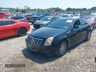 2013 Cadillac CTS Luxury with VIN 1G6DE5E55D0118722, listed as a IAAI auction lot 42448616 with 131,906 mi miles and . Bid and sale history available at DreamBid. Image 6.