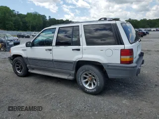 1995 Jeep Grand Cherokee Laredo с VIN 1J4GZ58S5SC724222, выставлен на аукционе Copart как лот 57837155 с пробегом 246 303 миль миль и Списание • Salvage title. История ставок и продаж доступна на DreamBid. Изображение 2.