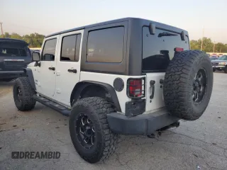2017 Jeep Wrangler Unlimited Sport with VIN 1C4BJWDG8HL557698, listed as a Copart auction lot 61863415 with 94,335 mi miles and Salvage title. Bid and sale history available at DreamBid. Image 2.