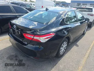 2019 Toyota Camry Hybrid LE z VIN 4T1B31HK0KU511923, wystawiony jako IAAI lot #42566419 z przebiegiem 67 166 mil mil oraz . Historia ofert i sprzedaży dostępna na DreamBid. Obrazek 23.