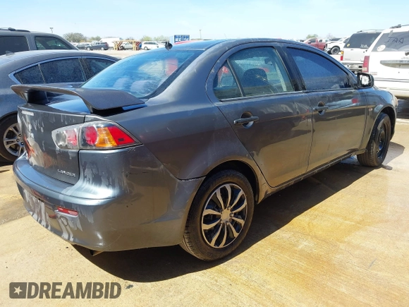 2010 Mitsubishi Lancer DE with VIN JA32U1FU1AU033241, listed as a IAAI auction lot 41805976 with 214,606 mi miles. Bid and sale history available at carsss.com. Image 4.