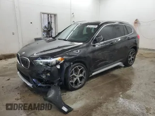 2018 BMW X1 sDrive28i with VIN WBXHU7C34J5L08334, listed as a Copart auction lot 52177725 with 81,074 mi miles and Salvage Title. Bid and sale history available at carsss.com. Image 1.