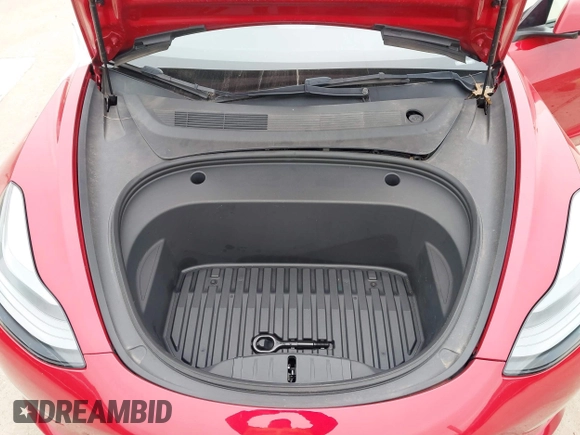 2023 Tesla Model 3 Long Range with VIN 5YJ3E1EB6PF388801, listed as a IAAI auction lot 41610678 with 20,144 mi miles and . Bid and sale history available at DreamBid. Image 10.