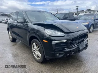 2016 Porsche Cayenne with VIN WP1AA2A26GKA13040, listed as a IAAI auction lot 42019833 with 87,594 mi miles. Bid and sale history available at carsss.com. Image 1.