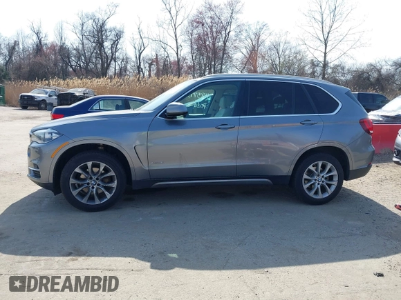 2015 BMW X5 xDrive35i with VIN 5UXKR0C53F0K60910, listed as a IAAI auction lot 41857733 with 153,583 mi miles. Bid and sale history available at carsss.com. Image 14.