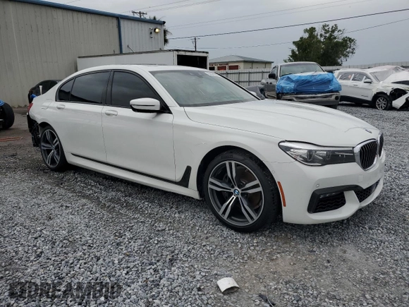 2016 BMW 7 Series 740i with VIN WBA7E2C52GG547112, listed as a Copart auction lot 63069355 with 76,867 mi miles and Salvage title. Bid and sale history available at DreamBid. Image 4.