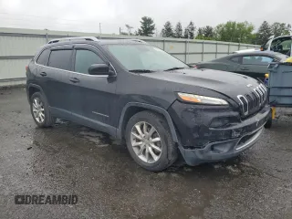 2014 Jeep Cherokee Limited with VIN 1C4PJLDS0EW106560, listed as a Copart auction lot 60785405 with 91,662 mi miles and Salvage title. Bid and sale history available at DreamBid. Image 4.