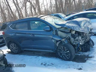 2021 Hyundai Tucson Ultimate z VIN KM8J3CALXMU339722, wystawiony jako IAAI lot #41217821 z przebiegiem 94 969 mil mil oraz . Historia ofert i sprzedaży dostępna na DreamBid. Obrazek 14.