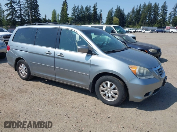 2009 Honda Odyssey EX-L with VIN 5FNRL38779B013943, listed as a IAAI auction lot 42119422 with 147,285 mi miles. Bid and sale history available at carsss.com. Image 1.